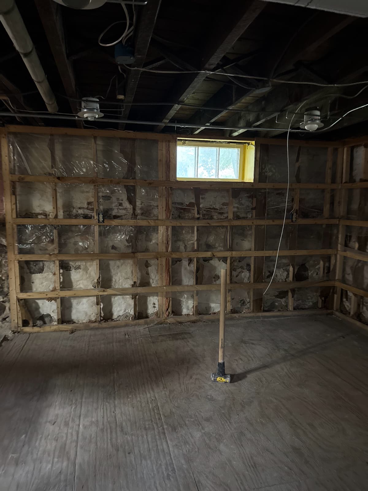 Interior basement demolition and debris removal project in Boston, MA