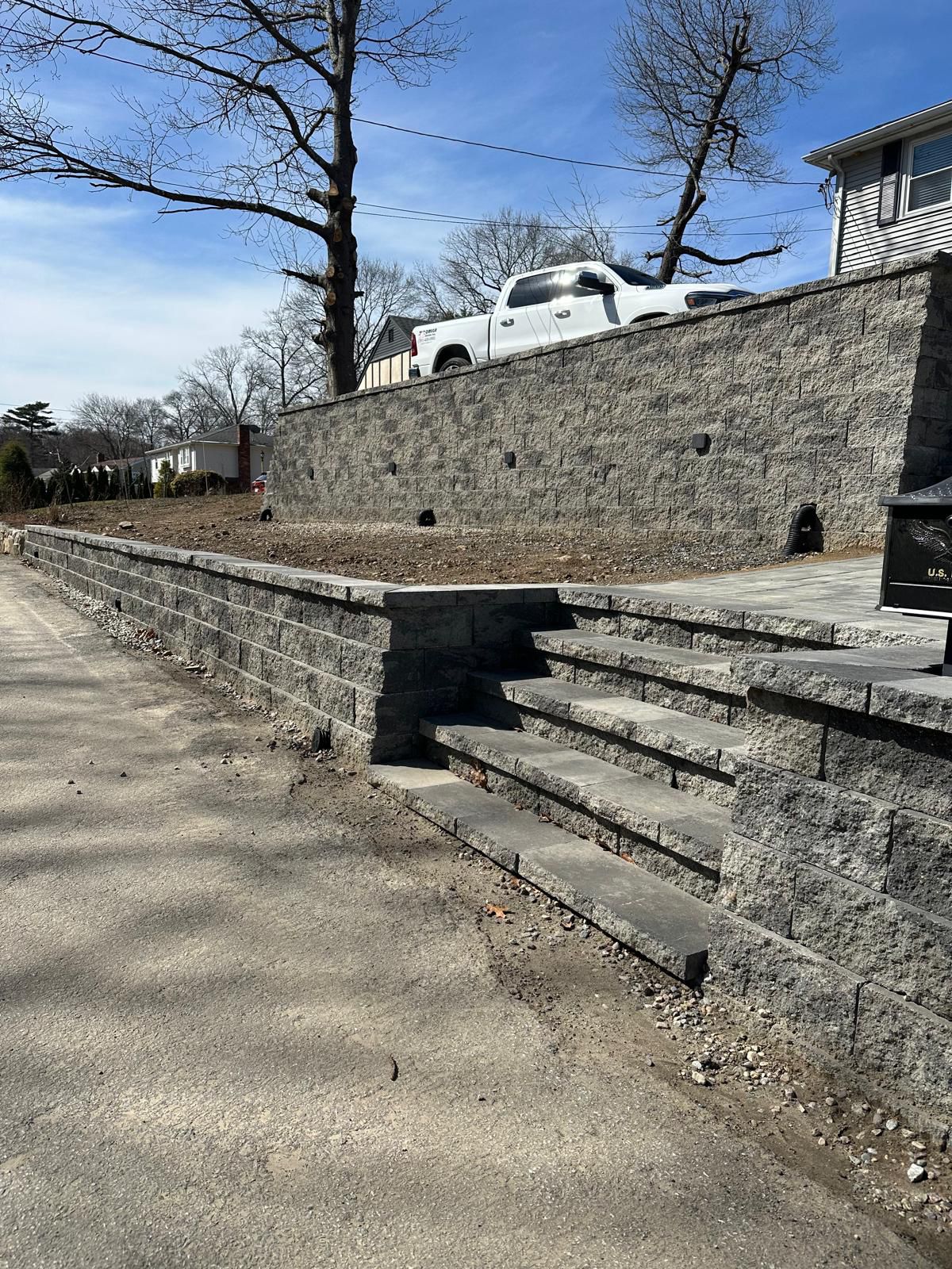 Granite block retaining wall with steps built in Boston, MA